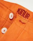 détails boutonnière pantalon achille orange mecanic