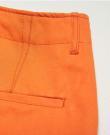 détails poche arrière pantalon orange kidur